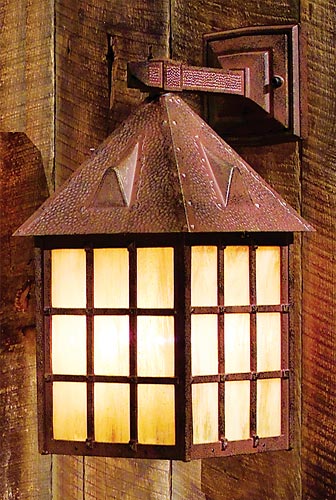 Abington Signature light on a wooden wall.