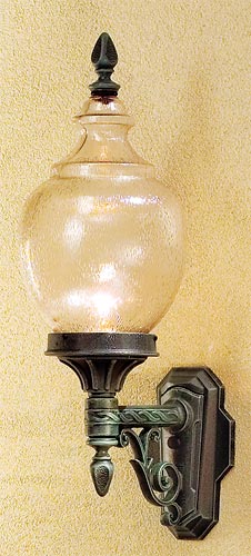 Clifton Park-B17270-VGN-CTP-MED wall fixture with a scroll arm.