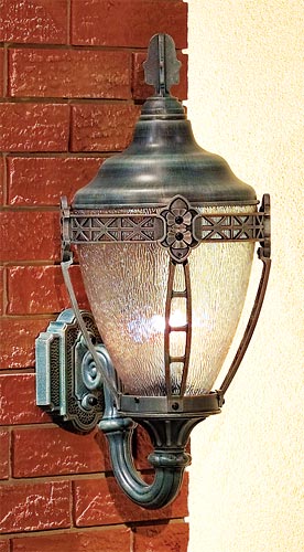 Grosse Pointe-B173FSM-VGN-CTP-MED wall fixture in verde finish on wall.